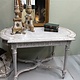 Antique French table with cross between the legs