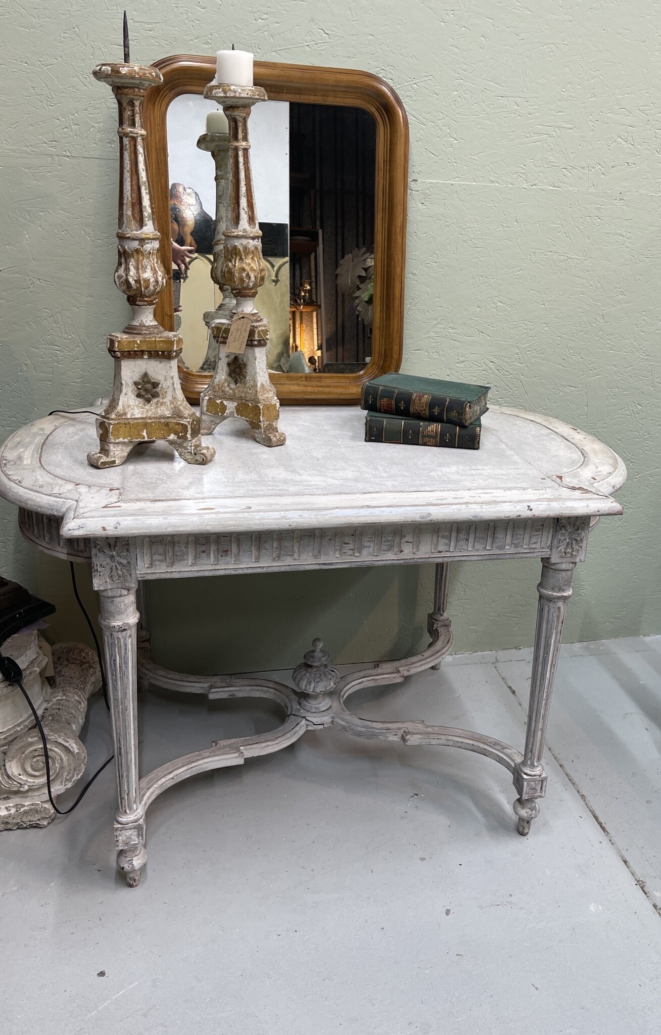 Antique French table with cross between the legs