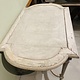 Antique French table with cross between the legs