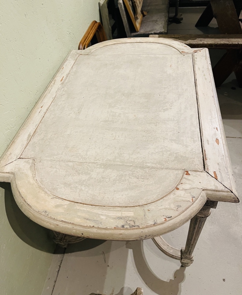 Antique French table with cross between the legs