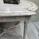 Antique French table with cross between the legs