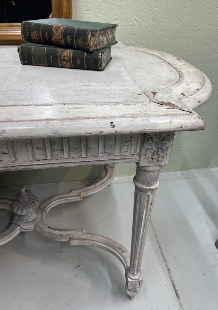 Antique French table with cross between the legs