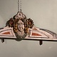 Antique ornament of a merry-go-round
