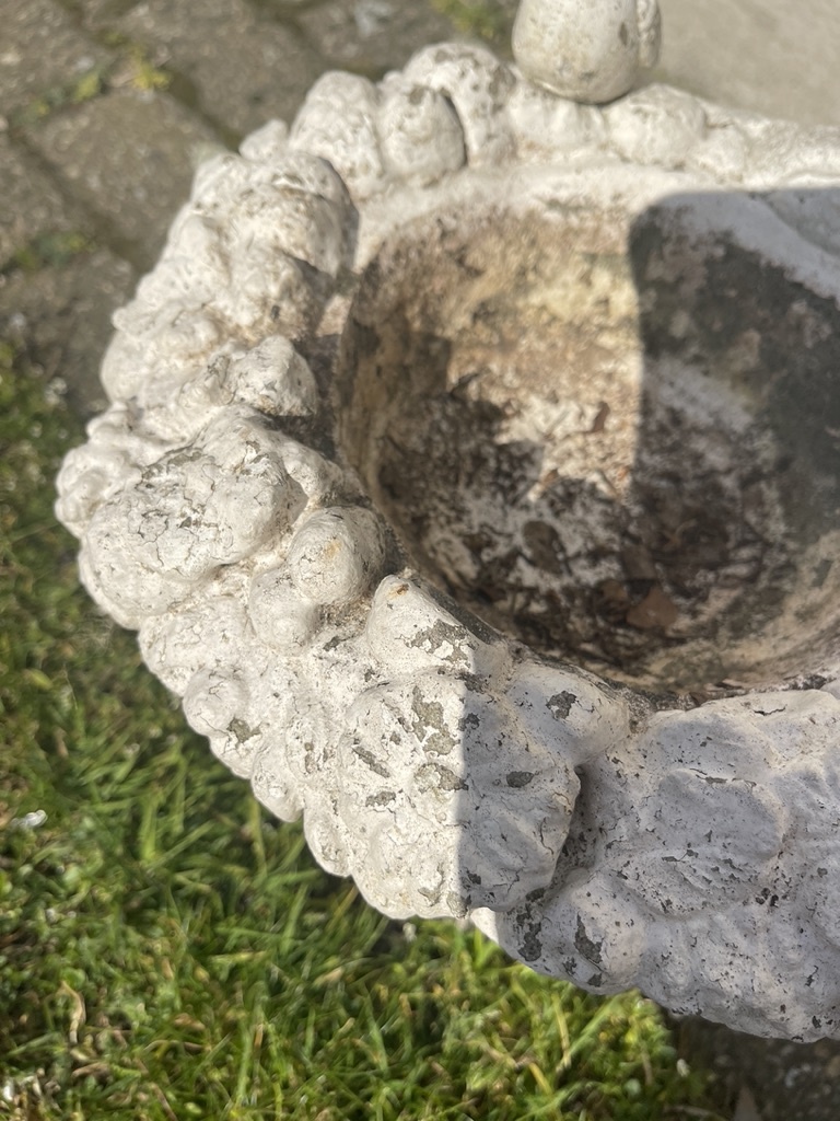 Vintage bird bath on a stand