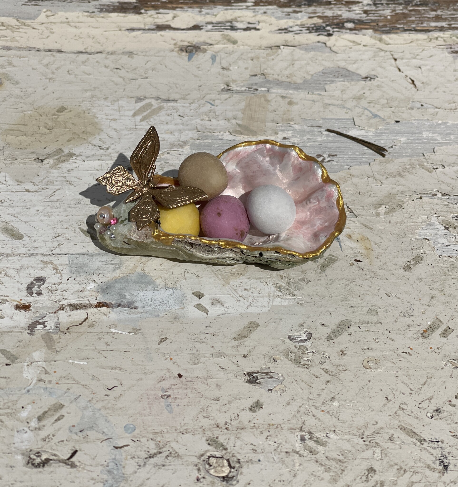 Little dish made from a painted and crafted oyster