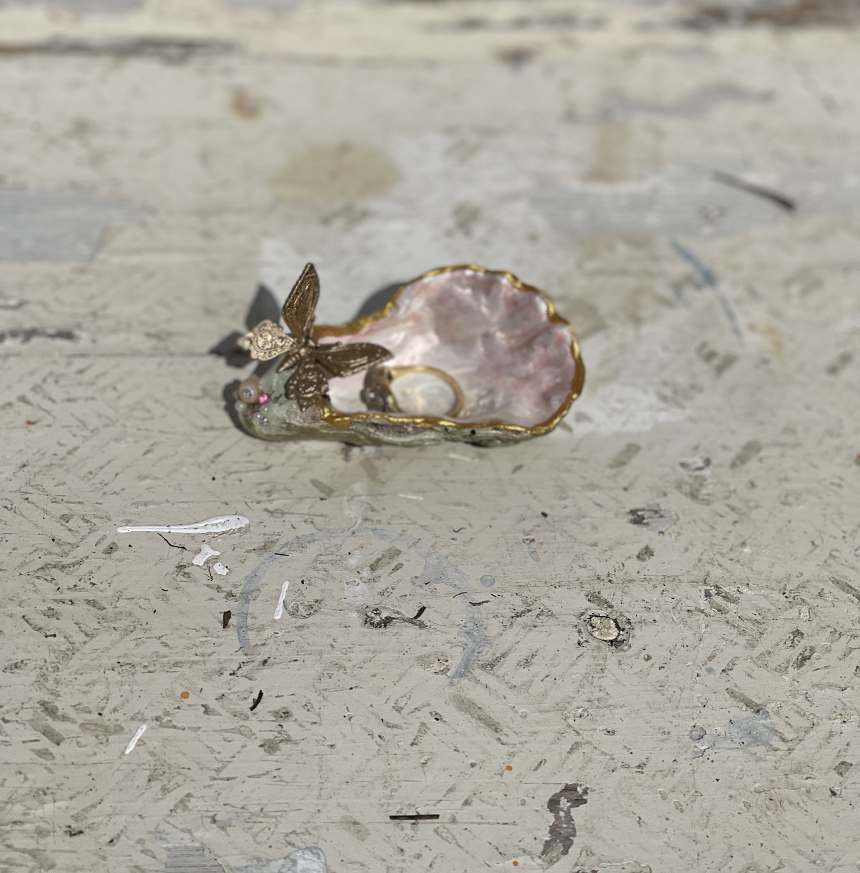 Little dish made from a painted and crafted oyster