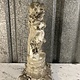 Antique garden statue, little guy with large fish