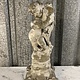 Antique garden statue, little guy with large fish