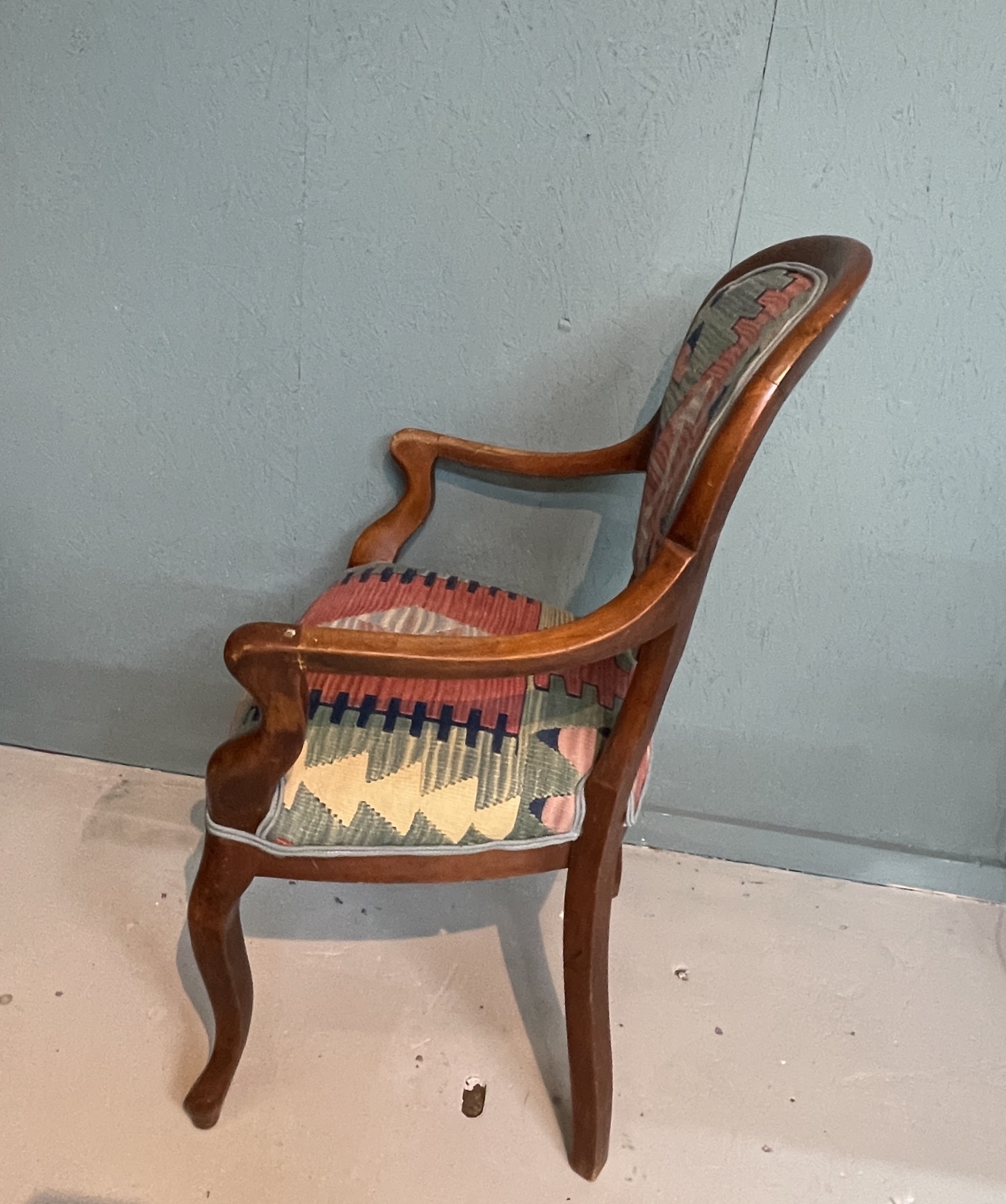 Antique chair re-upholstered with an antique kelim