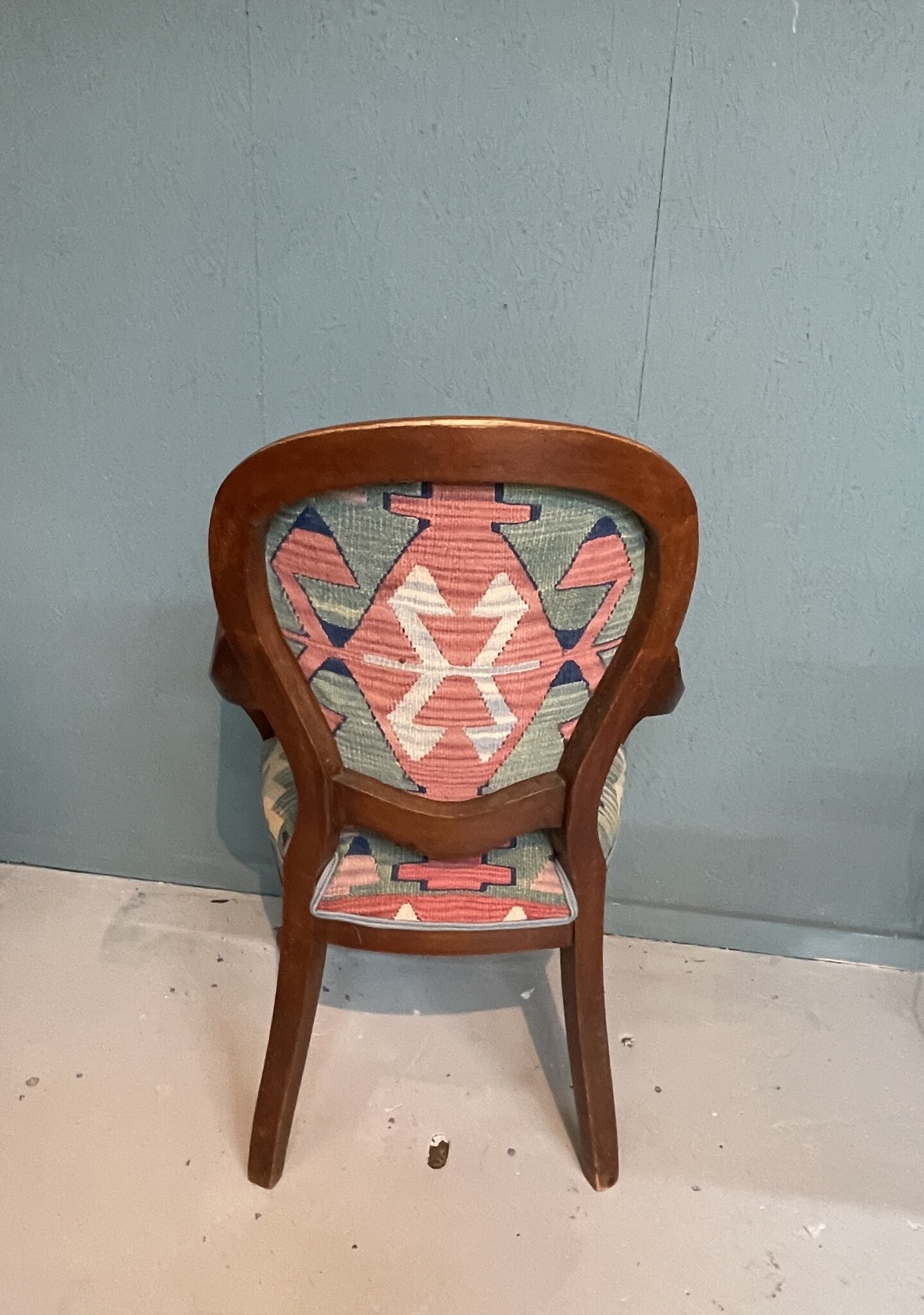 Antique chair re-upholstered with an antique kelim
