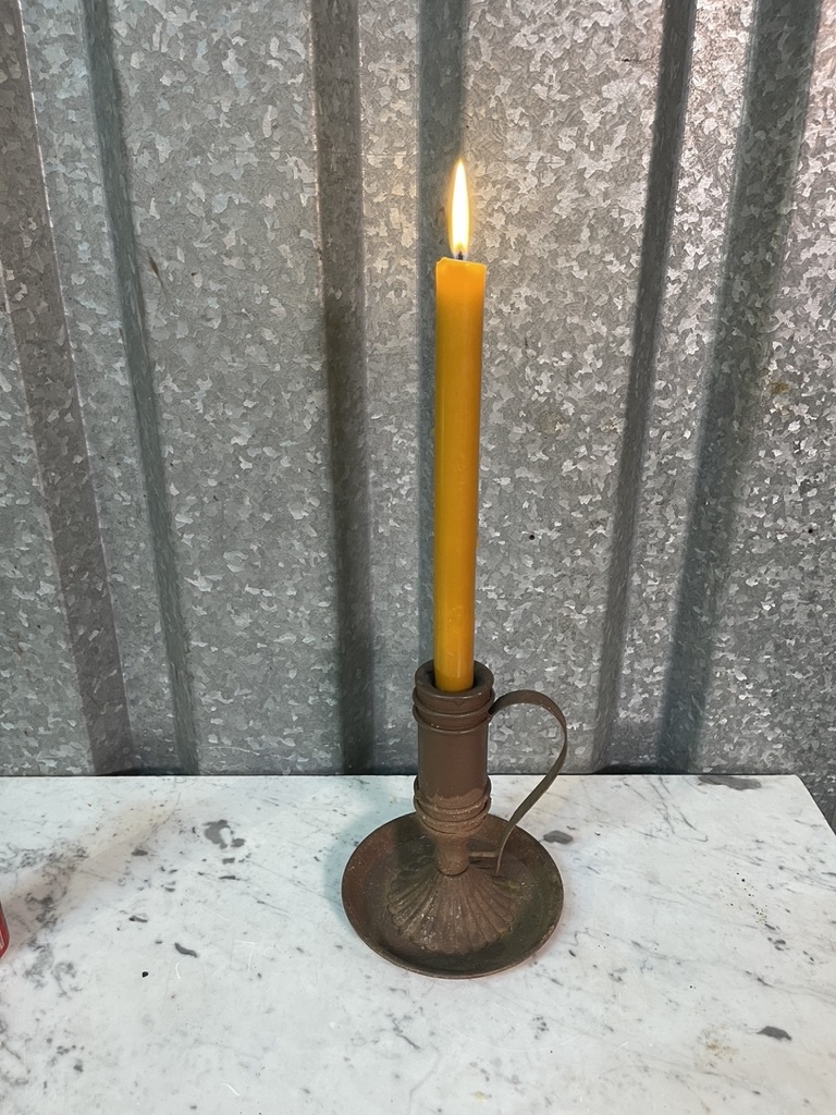 Rustic rusty candlestick, not very old but very decorative