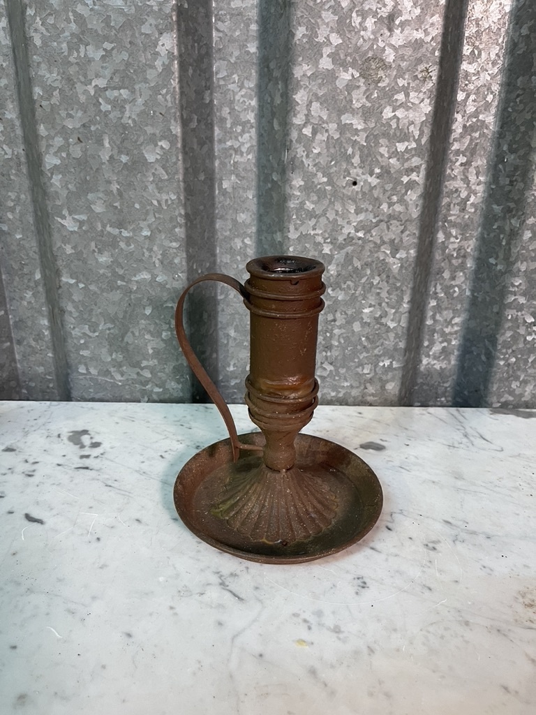 Rustic rusty candlestick, not very old but very decorative