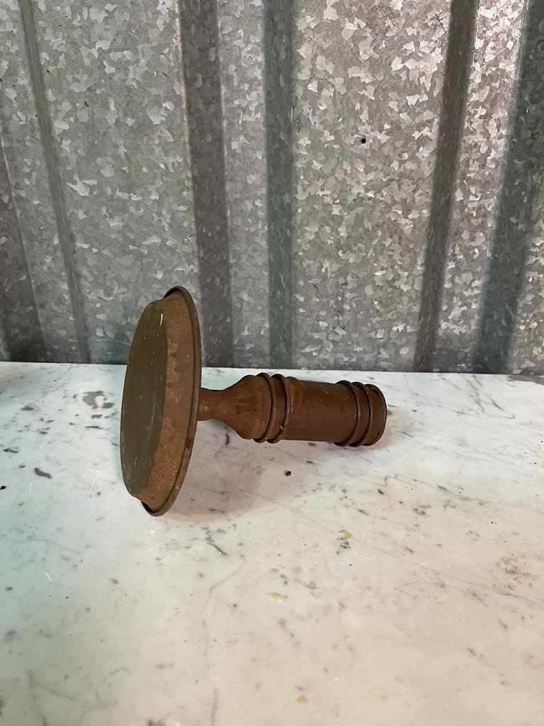 Rustic rusty candlestick, not very old but very decorative