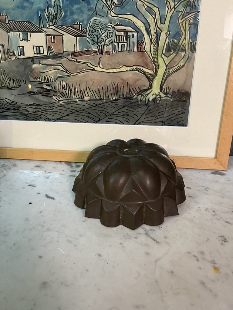 Antique backing tin or pudding tin with hanging hook