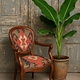 Antique chair re-upholstered with an antique kelim
