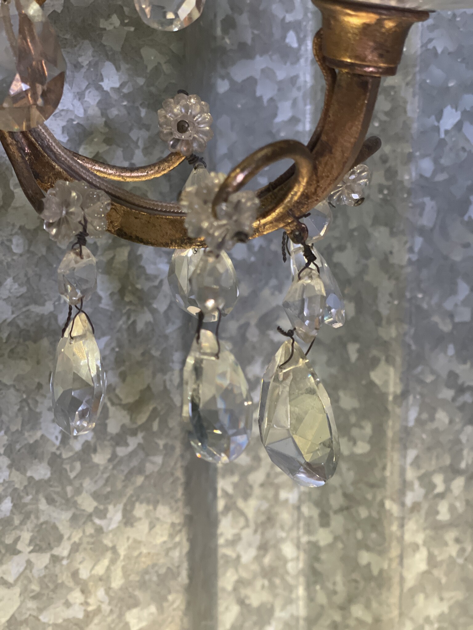 Set of three vintage wall sconces with glass pendant drops