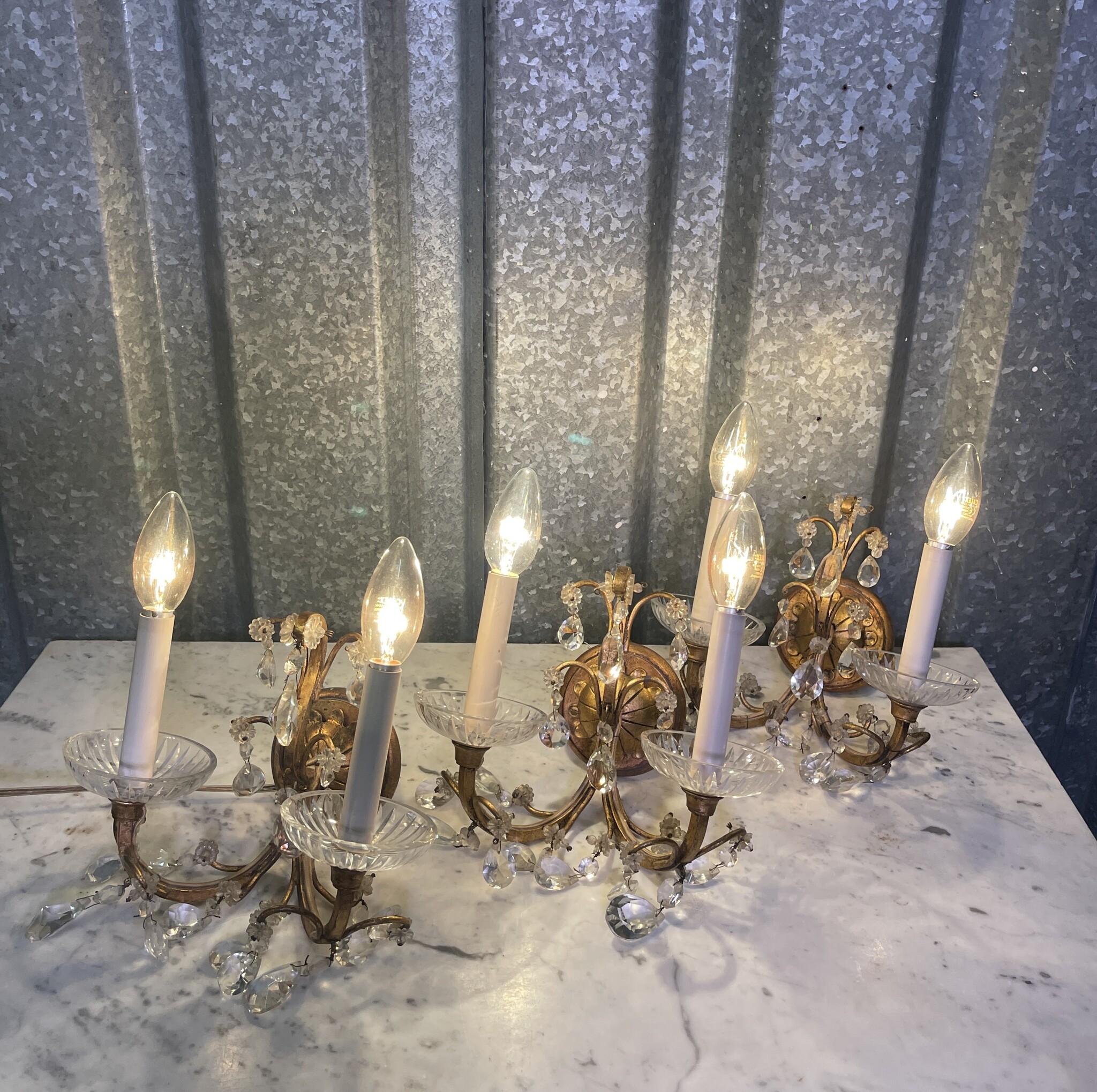 Set of three vintage wall sconces with glass pendant drops