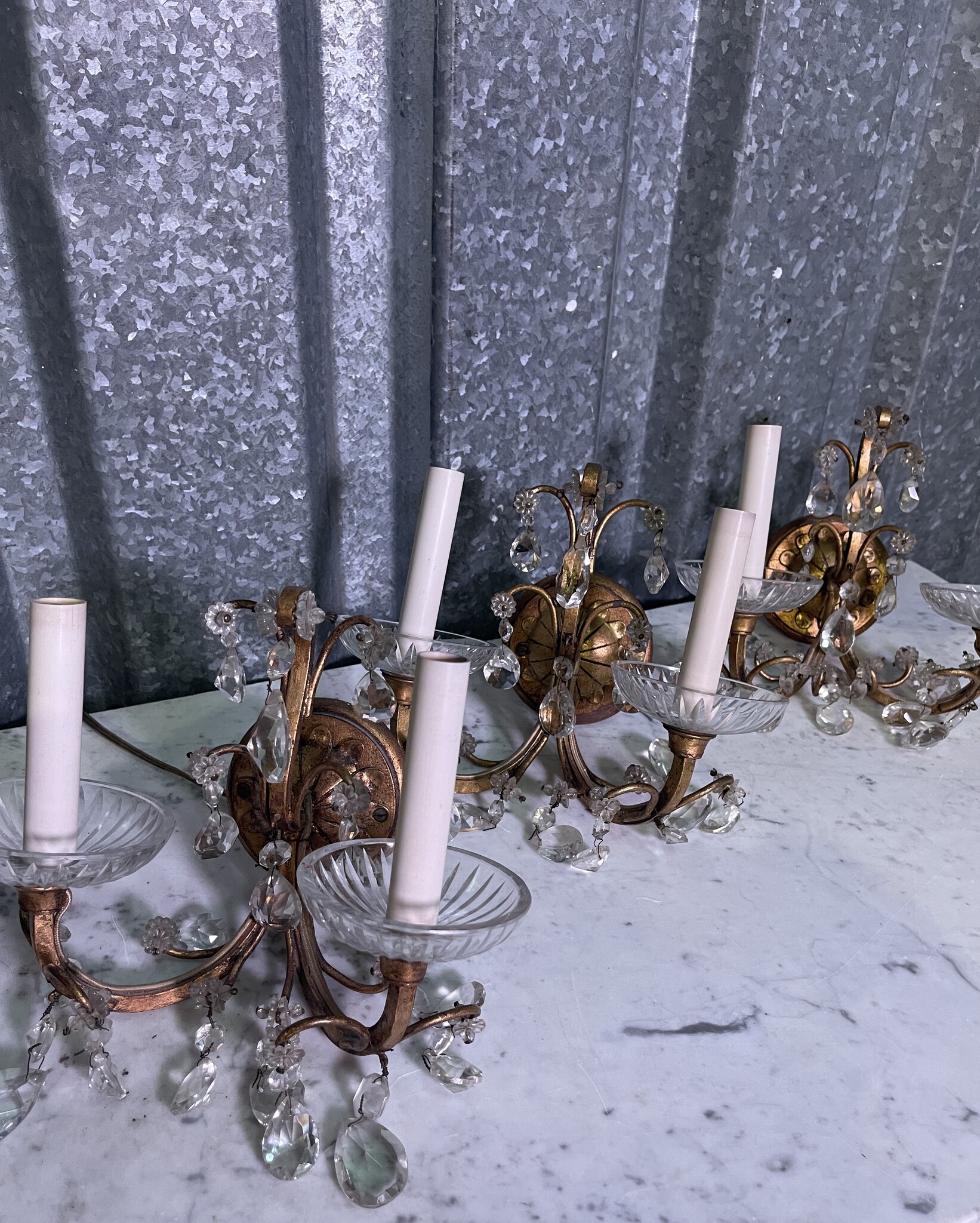 Set of three vintage wall sconces with glass pendant drops