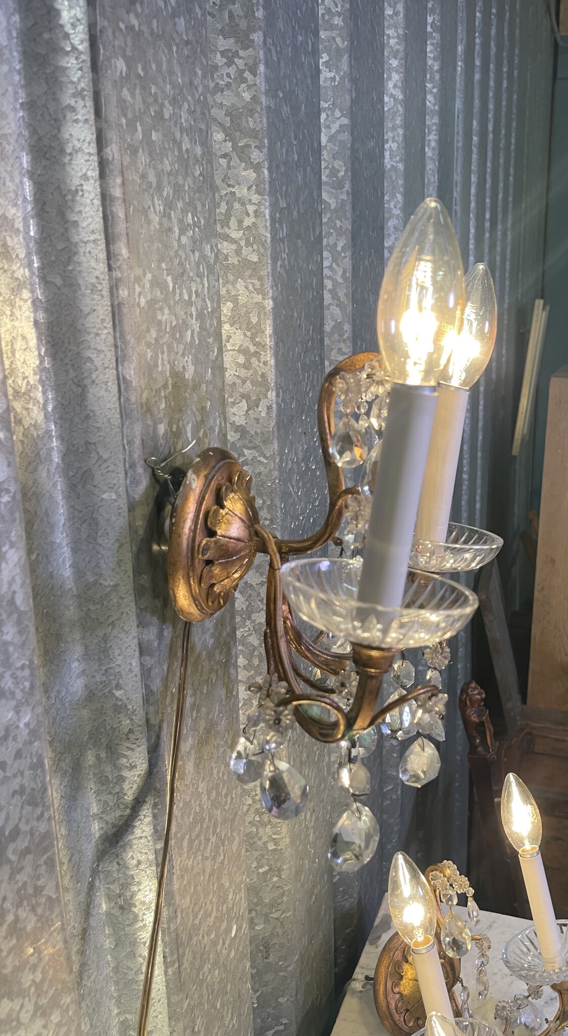 Set of three vintage wall sconces with glass pendant drops
