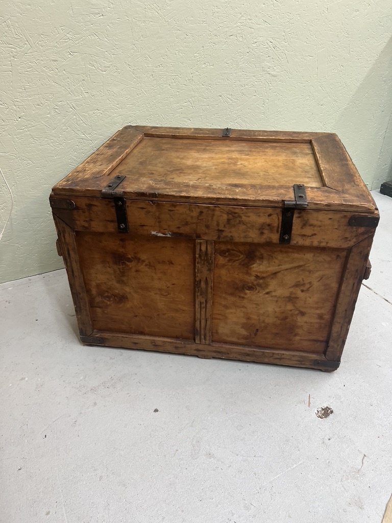 Old transport box with iron corners and buckle