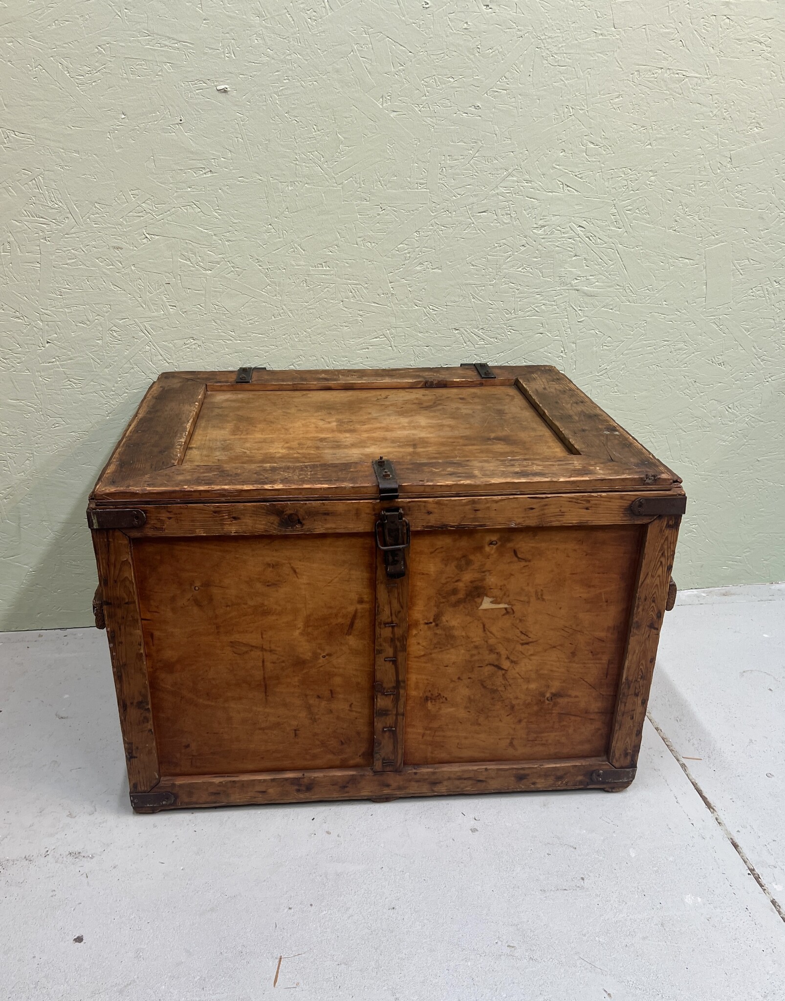 Old transport box with iron corners and buckle