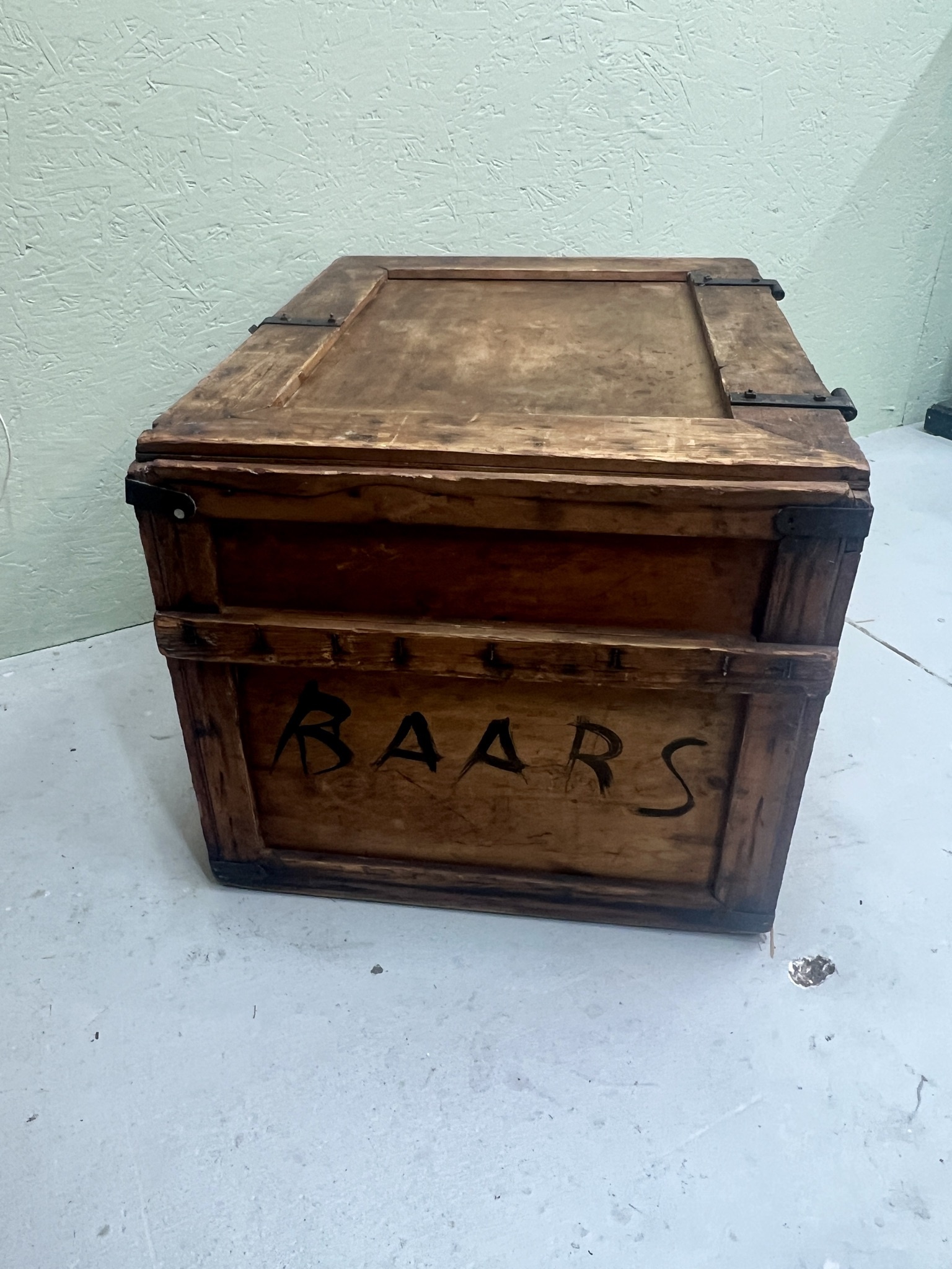 Old transport box with iron corners and buckle