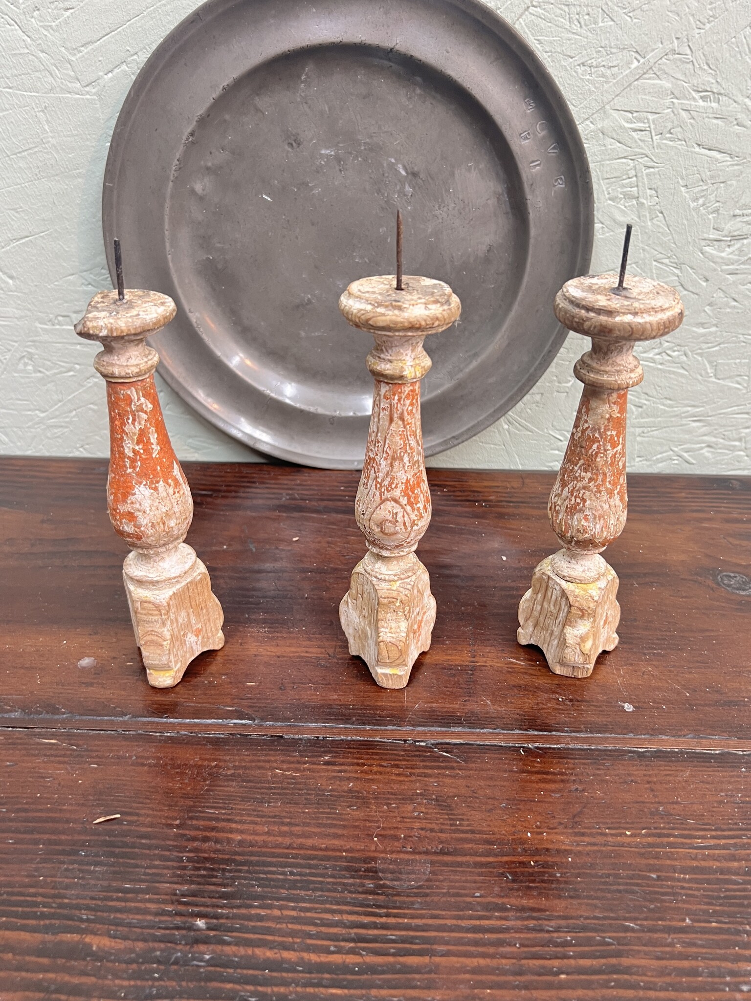 Antique tiny church candlesticks with traces of the old paint