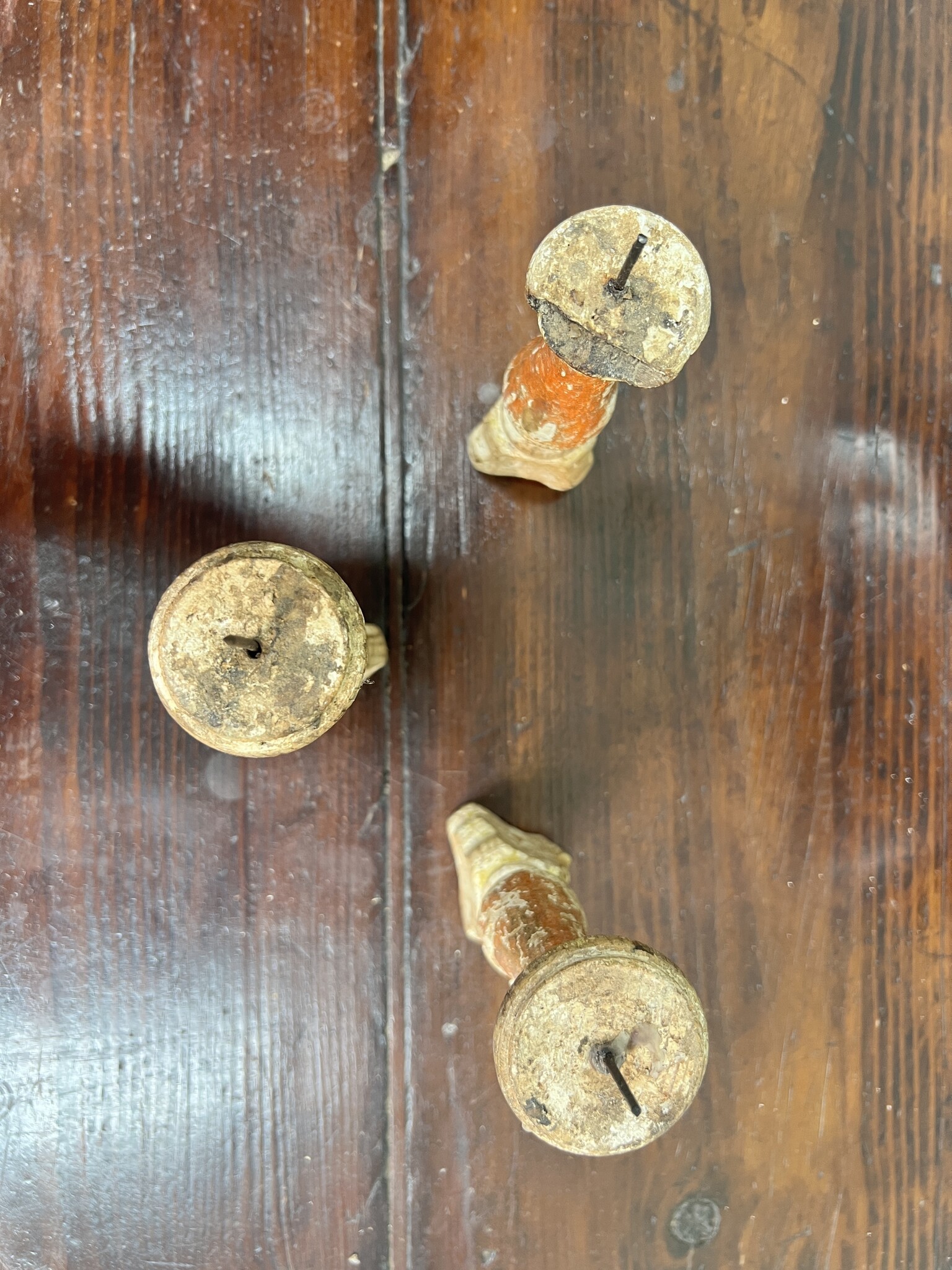 Antique tiny church candlesticks with traces of the old paint