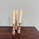 Antique tiny church candlesticks with traces of the old paint