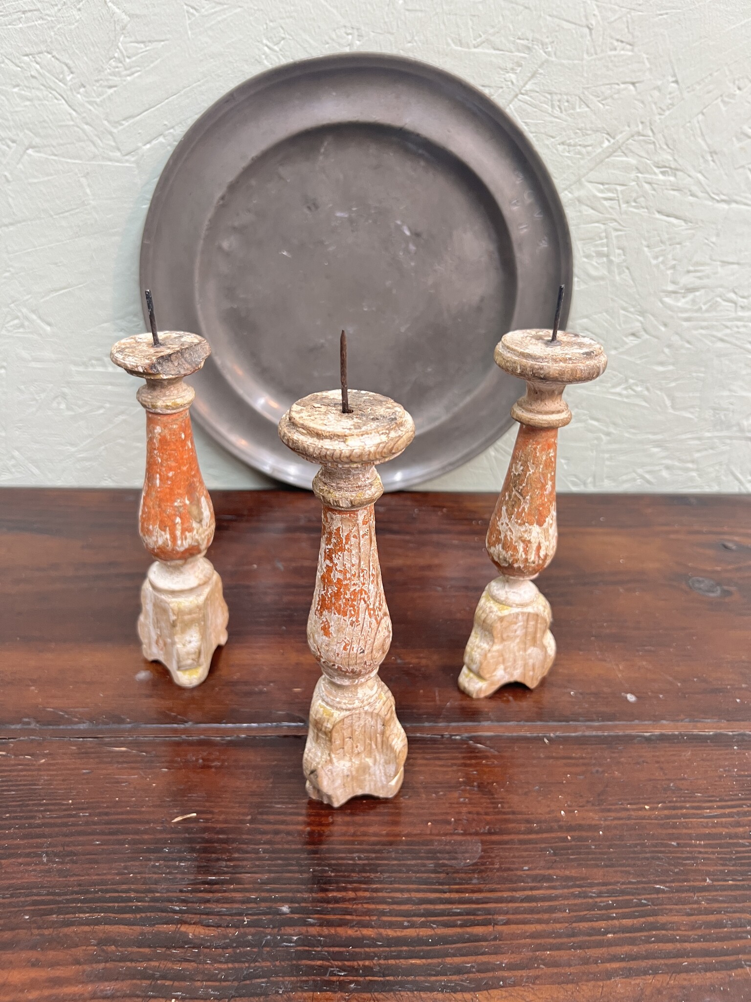 Antique tiny church candlesticks with traces of the old paint