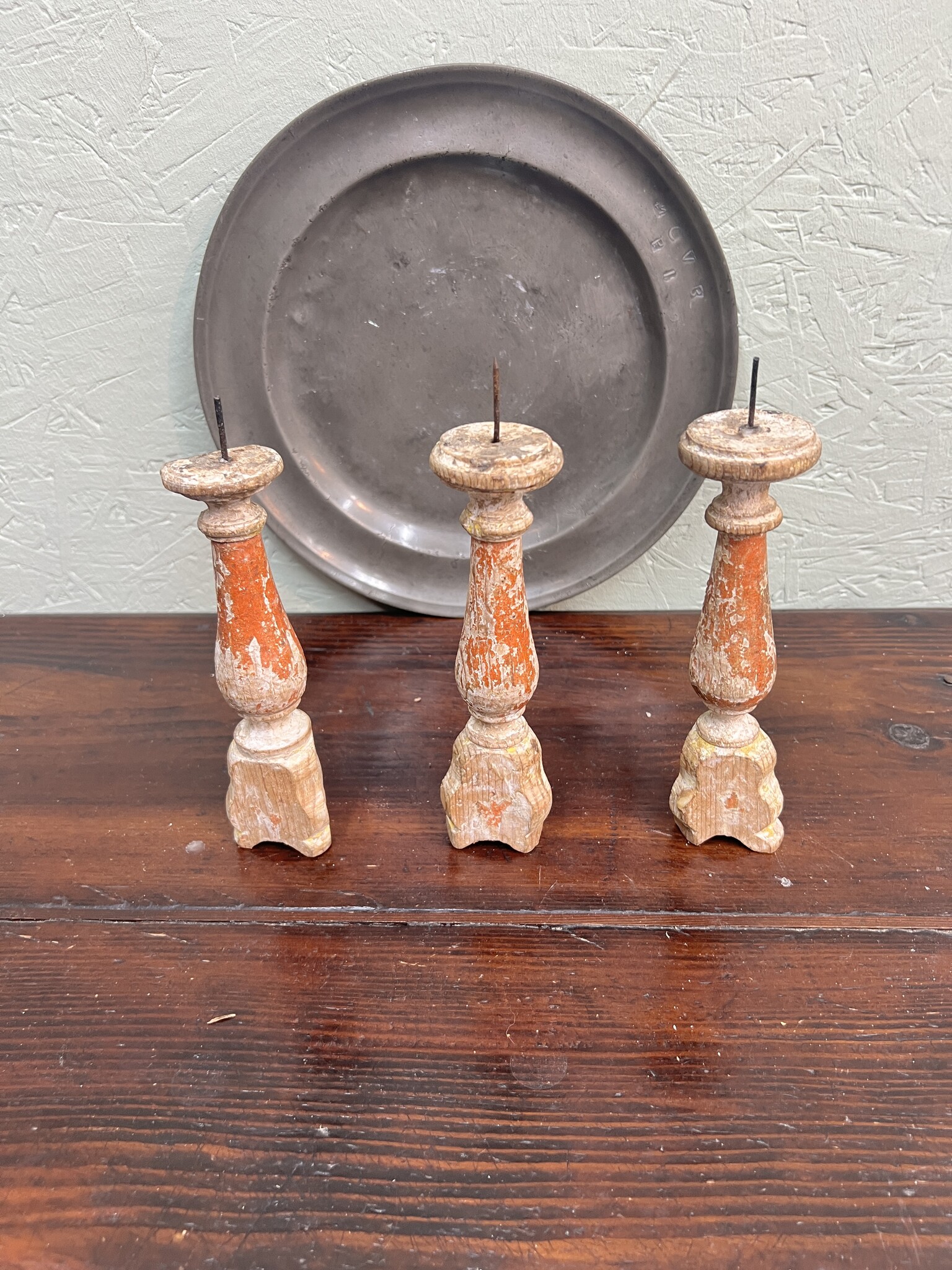 Antique tiny church candlesticks with traces of the old paint