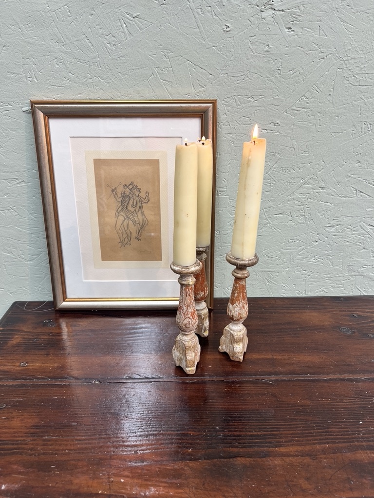 Antique tiny church candlesticks with traces of the old paint