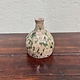 Little vase by a Creative Mastermind, stone ware
