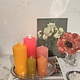 A package with  5 block  candles in colours that remind you of summer in the fall
