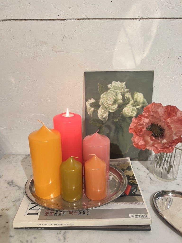 A package with  5 block  candles in colours that remind you of summer in the fall