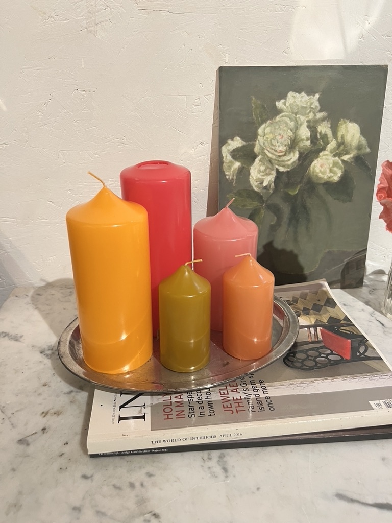 A package with  5 block  candles in colours that remind you of summer in the fall