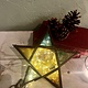 Lovely vintage star with different colours glass