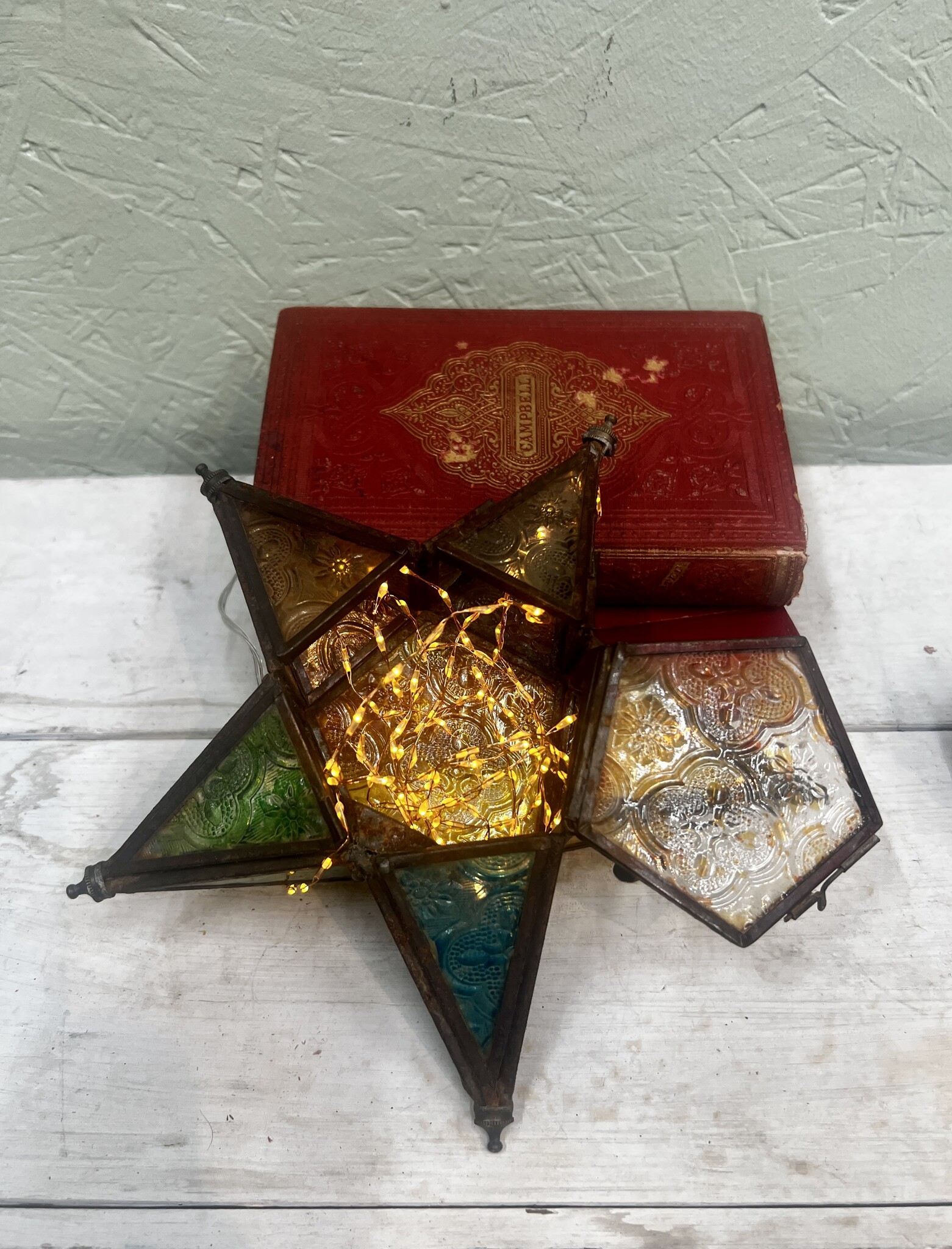 Lovely vintage star with different colours glass