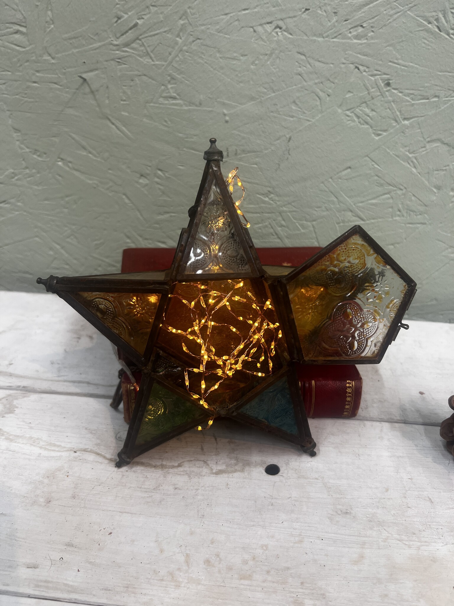 Leuke vintage ster met verschillende kleurtjes glas