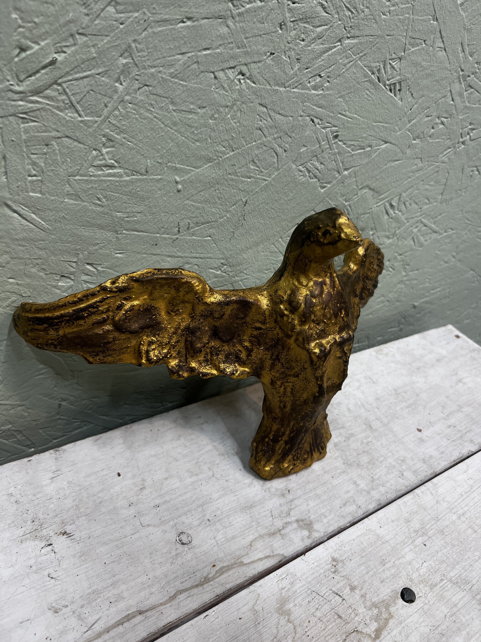 Gilded plaster eagle or falcon