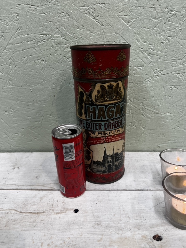 Haga's boter- dribbelaars koekblik, antiek