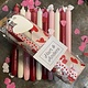 A package with 10 candles, red,  ivory and pink for your Valentine