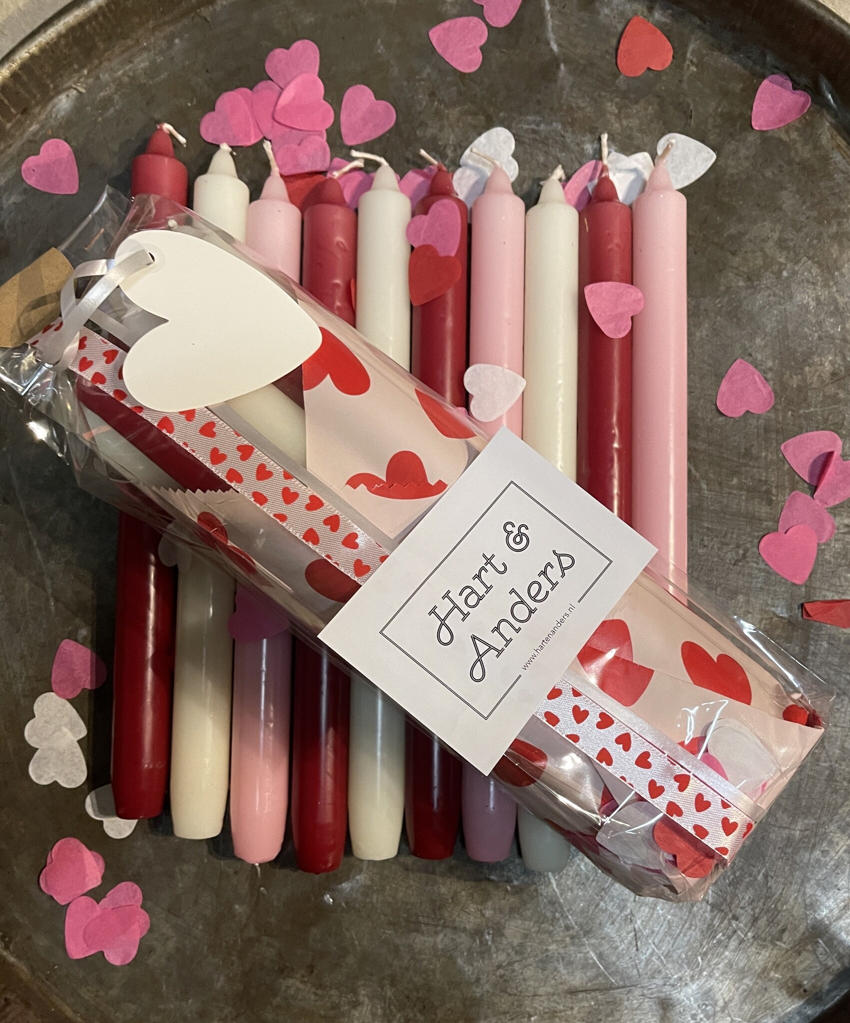 A package with 10 candles, red,  ivory and pink for your Valentine