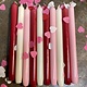 A package with 10 candles, red,  ivory and pink for your Valentine
