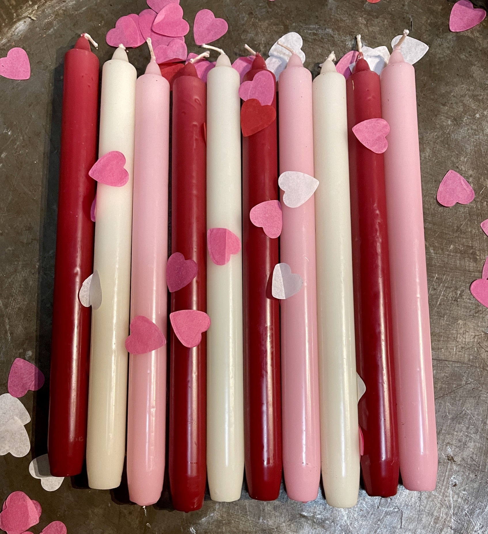 A package with 10 candles, red,  ivory and pink for your Valentine