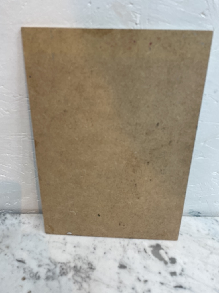 Painting of a lady with a hat on the boulevard