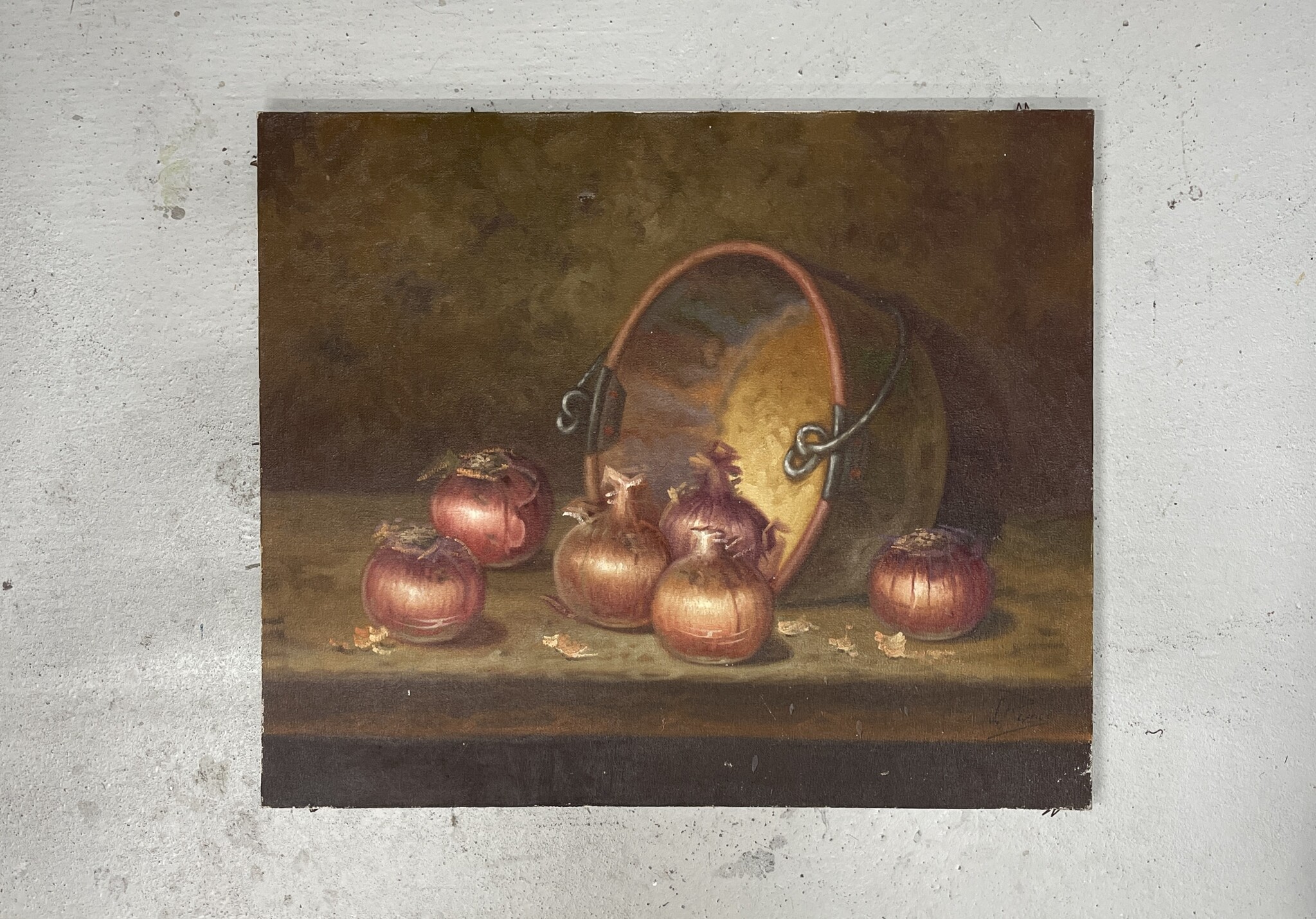 Merry 'kitchen painting' of onions draped from a pot on a table.