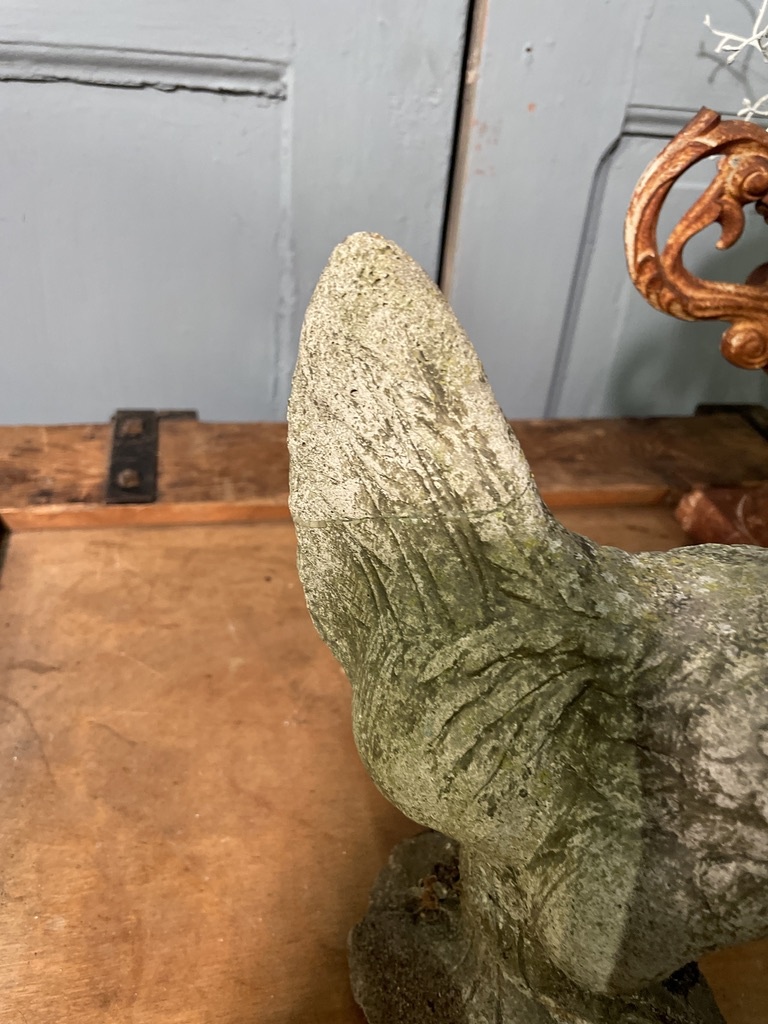 Vintage garden statue of a perky little rooster