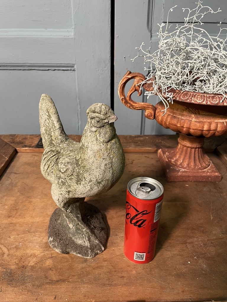 Vintage garden statue of a perky little rooster
