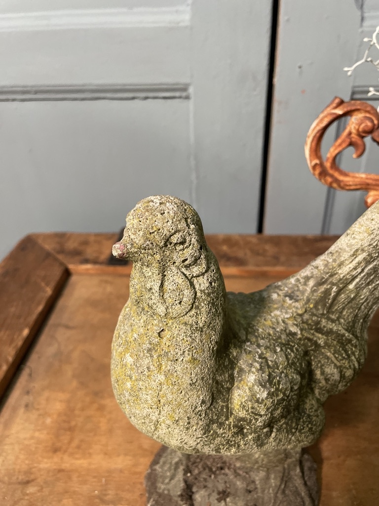 Vintage garden statue of a perky little rooster